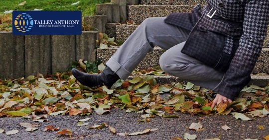 woman slipping leaves